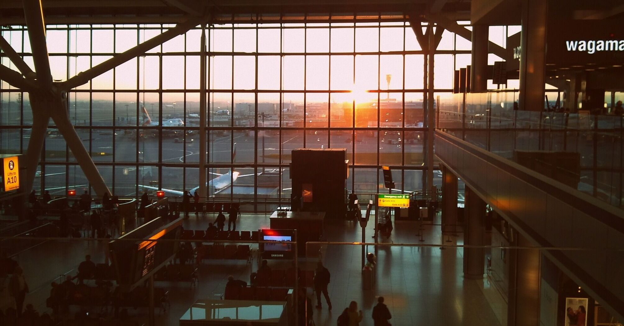 View of Heathrow Airport terminal with sunrise