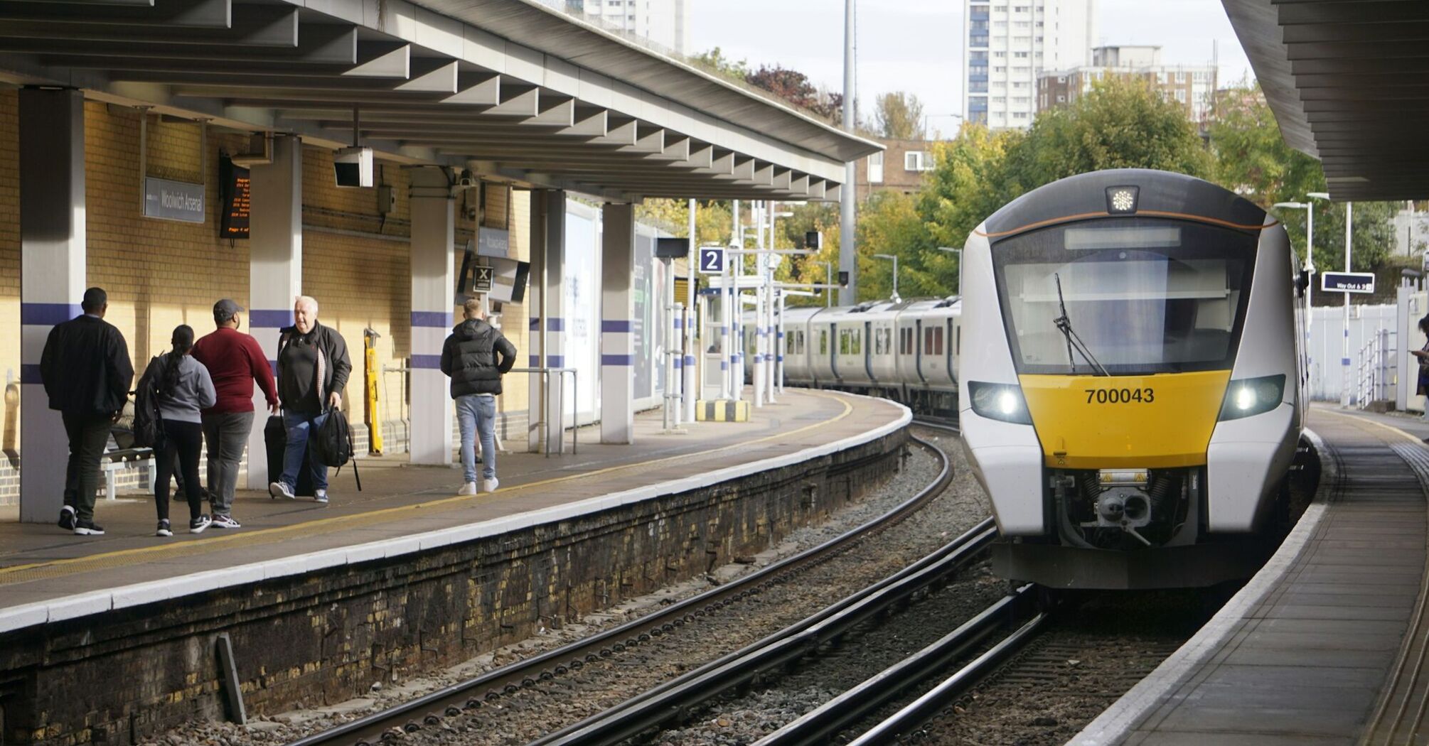 Thameslink train at a busy station platform with passengers waiting