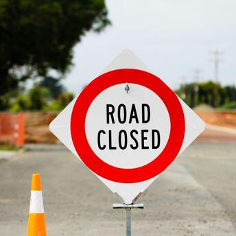 Road closed sign at a construction site