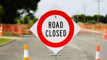 Road closed sign at a construction site