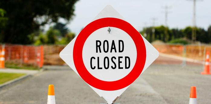 Road closed sign at a construction site
