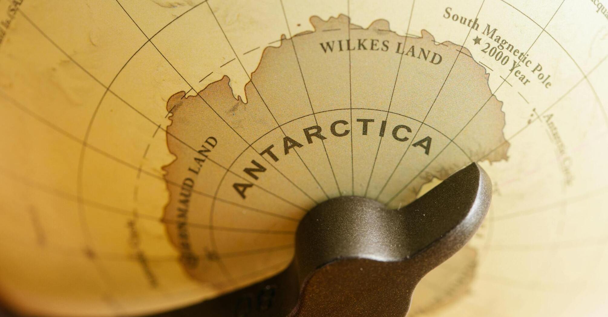 Close-up of Antarctica on a globe