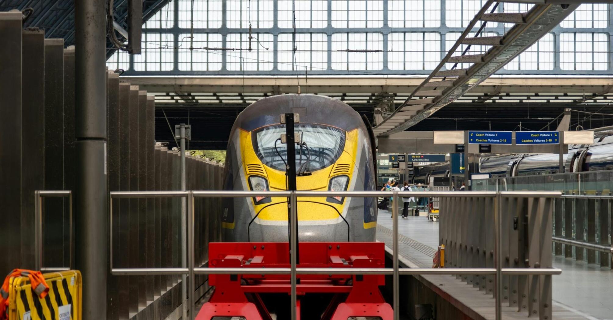 A Eurostar train at a station platform, ready for departure