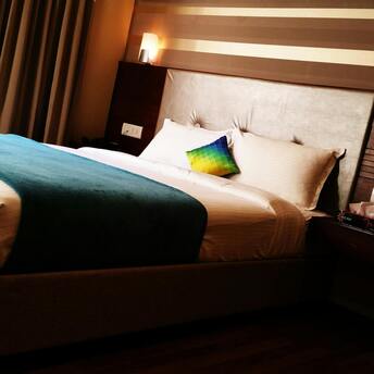 Comfortable hotel room with a cozy bed and modern decor