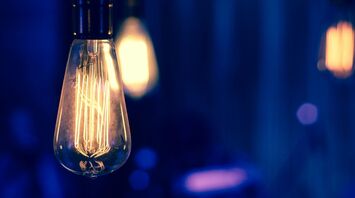 Vintage-style light bulb glowing warmly