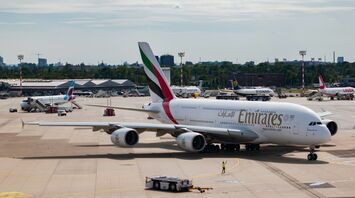 An Emirates Airbus A380 on the tarmac at an airport