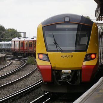 South Western Railway train arriving at a station
