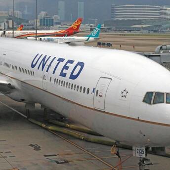 United Airlines aircraft parked at the terminal