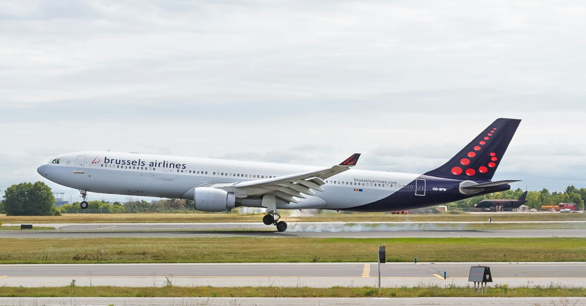 Brussels Airlines aircraft landing on a runway