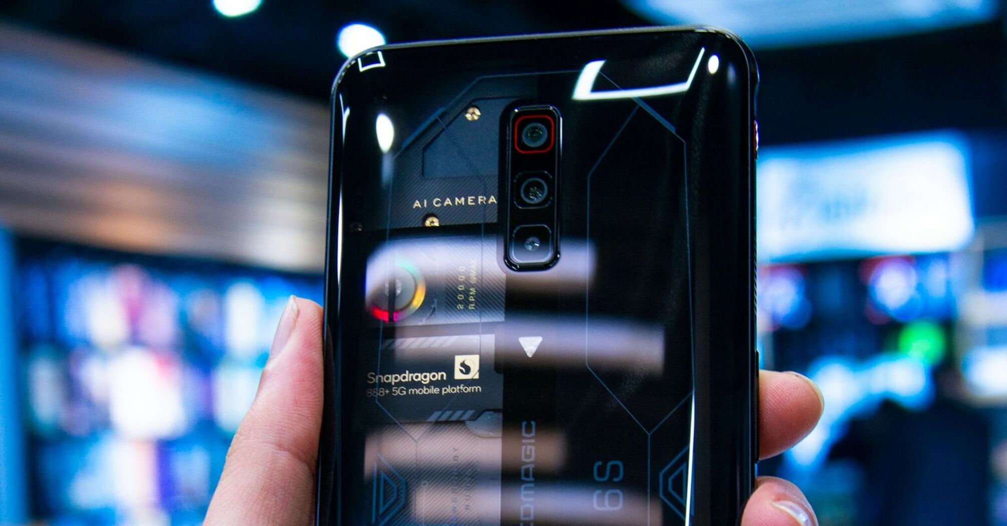 A smartphone showcasing transparent back design and internal components