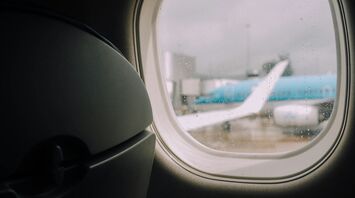View from airplane window during stormy weather