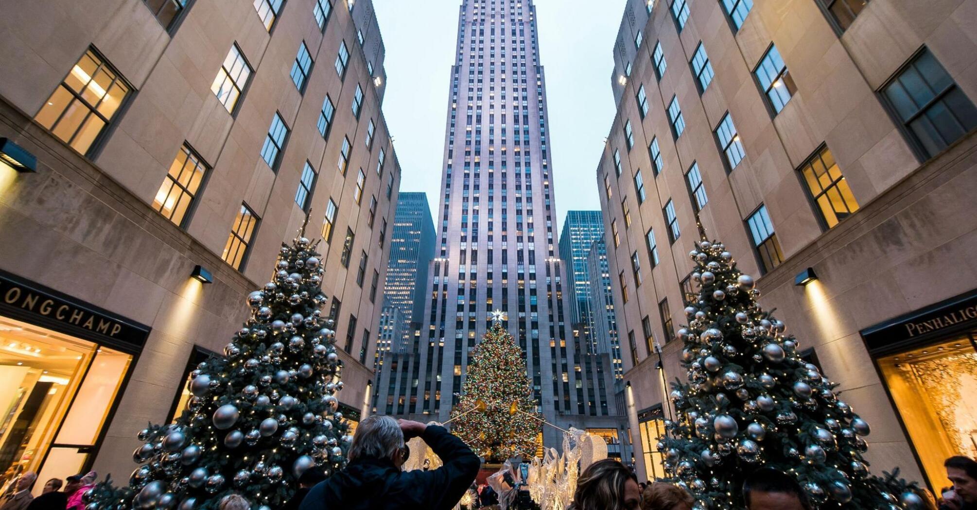 A festive Rockefeller Center with a decorated Christmas tree and holiday ornaments in New York City