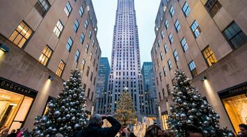 A festive Rockefeller Center with a decorated Christmas tree and holiday ornaments in New York City