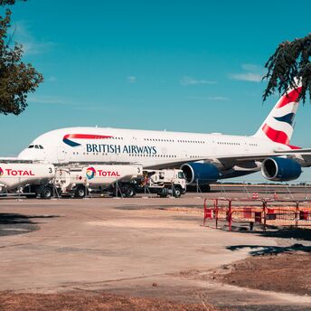 The British Airways plane was unable to take off on time from Italy due to incorrect seat cushions