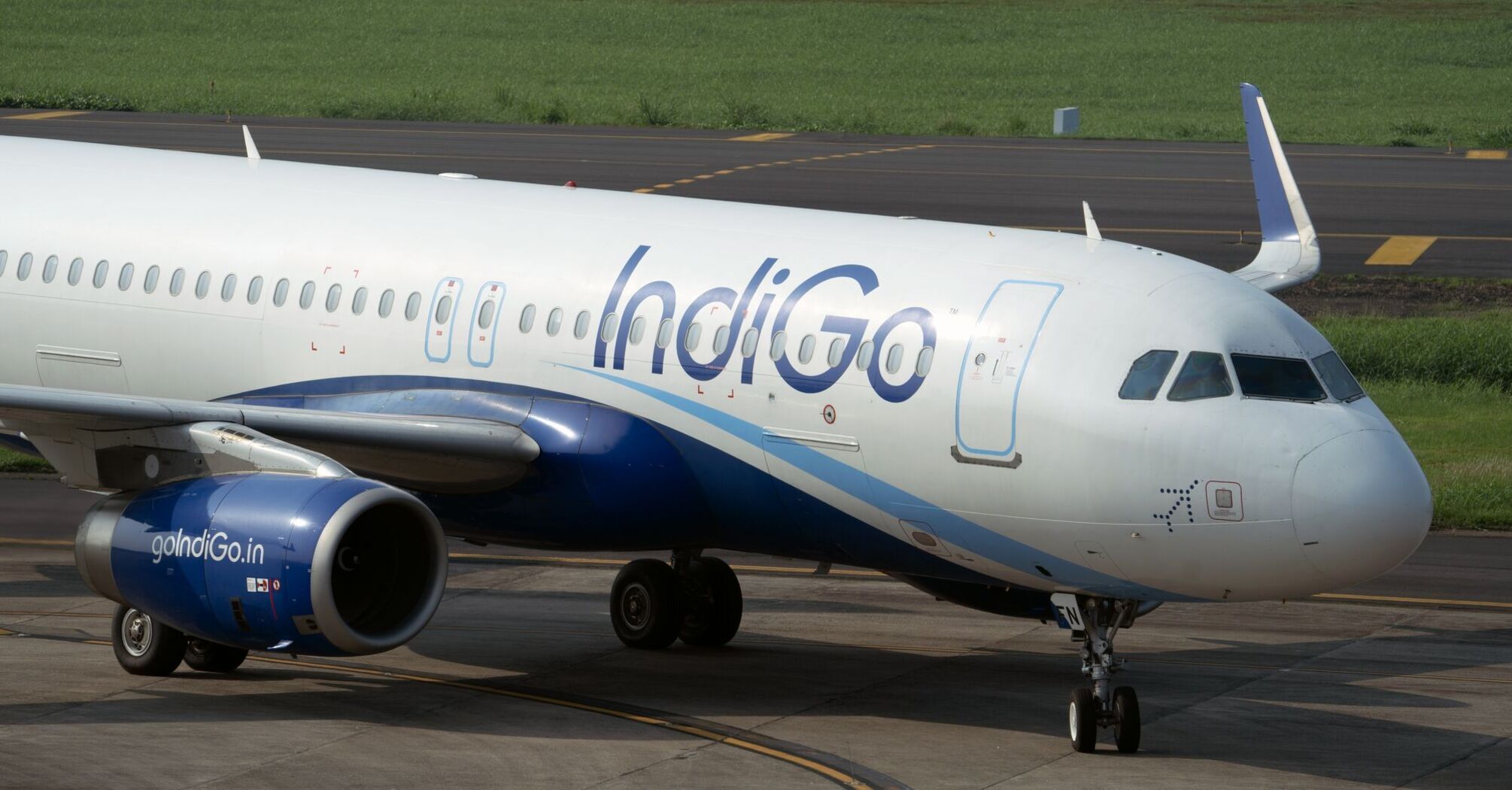 IndiGo commercial aircraft on the tarmac with the company logo visible on the fuselage