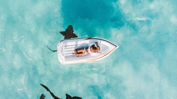 Floating over nurse sharks in the Bahamas on Great Exuma