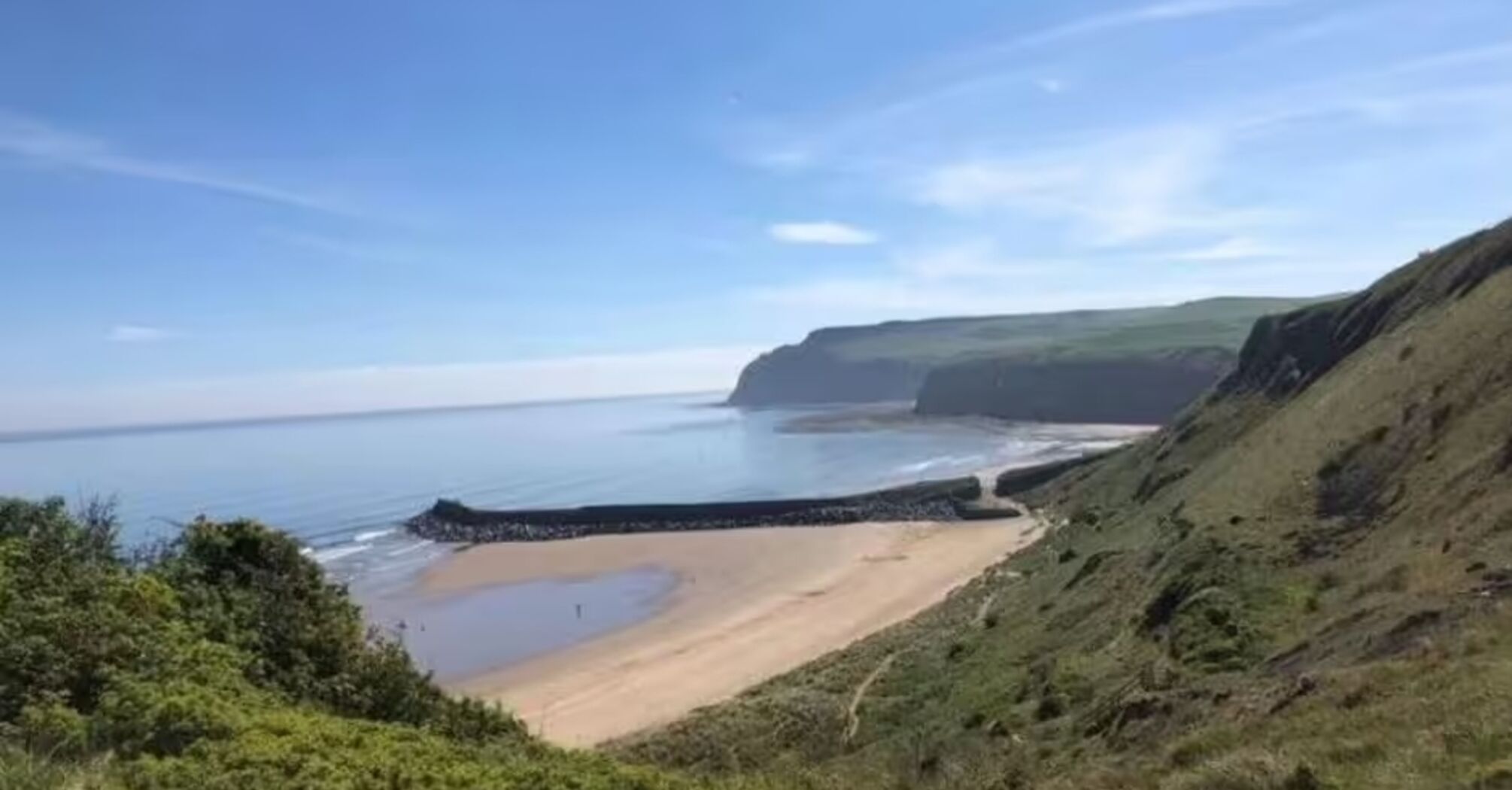 A cozy British beach where you can see dolphins