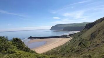 A cozy British beach where you can see dolphins
