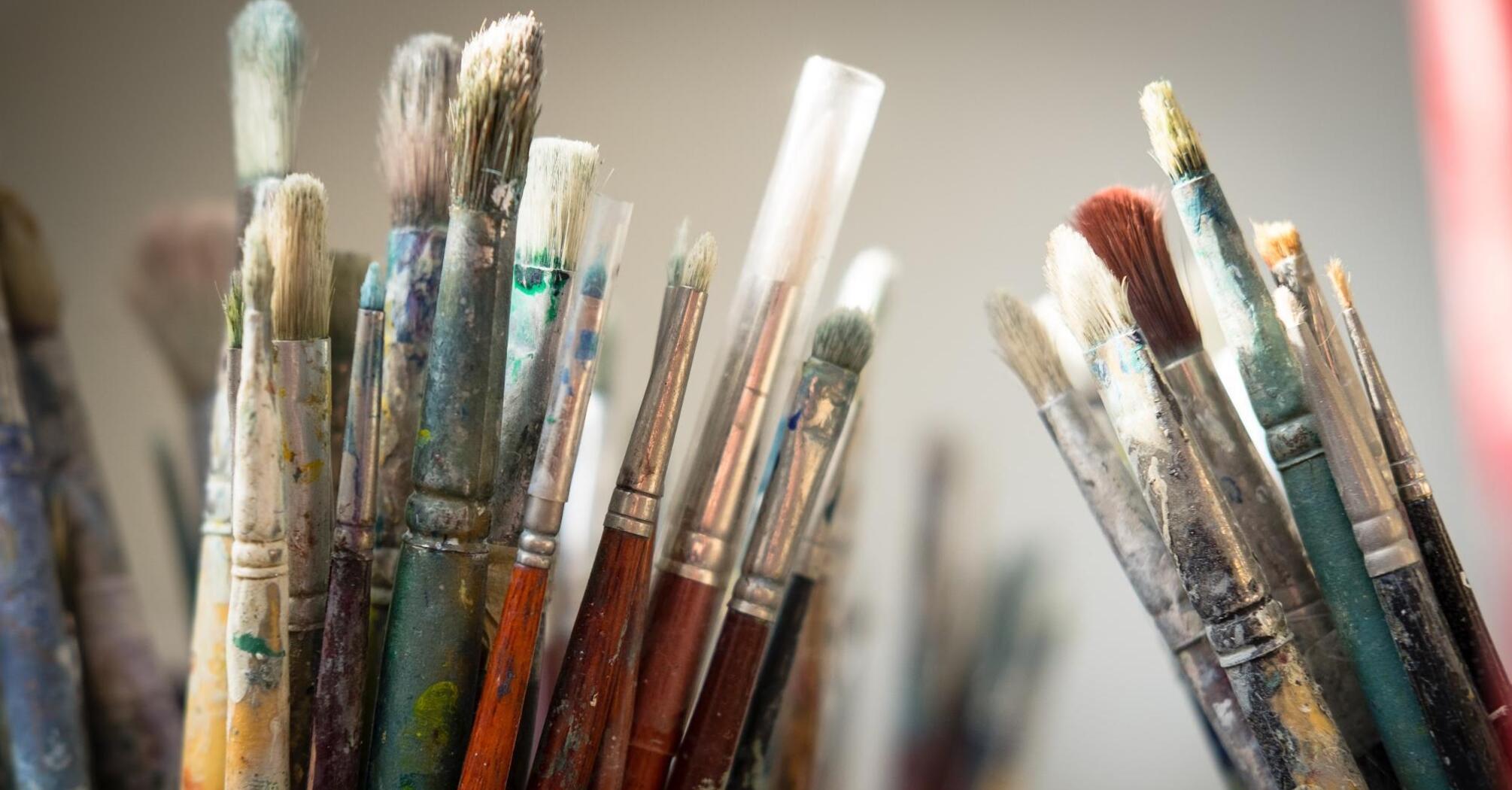 Brushes stained with paint