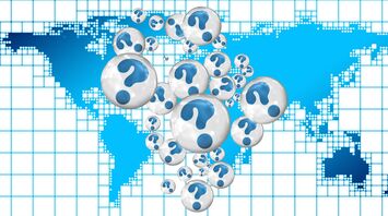 A digital image featuring numerous white question marks inside bubbles over a blue background with a pixelated world map design