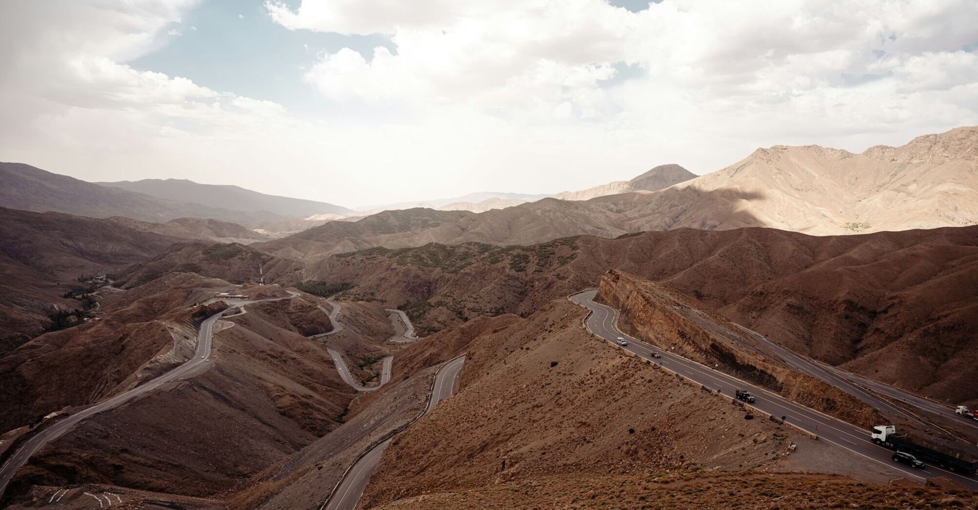 Winding roads meandering through the arid mountainous landscape of Morocco