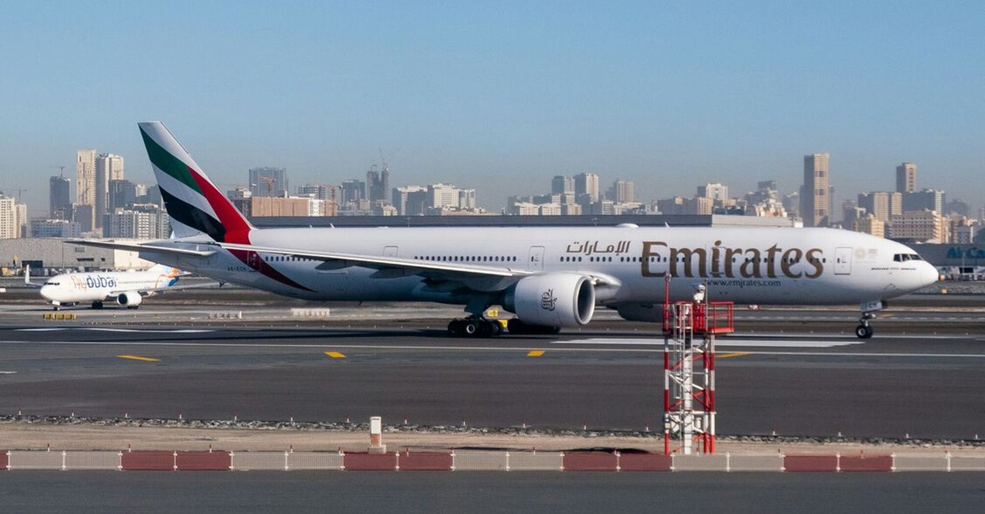 Emirates plane on the runway
