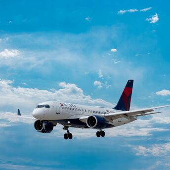 Delta Air Lines plane flying in the sky