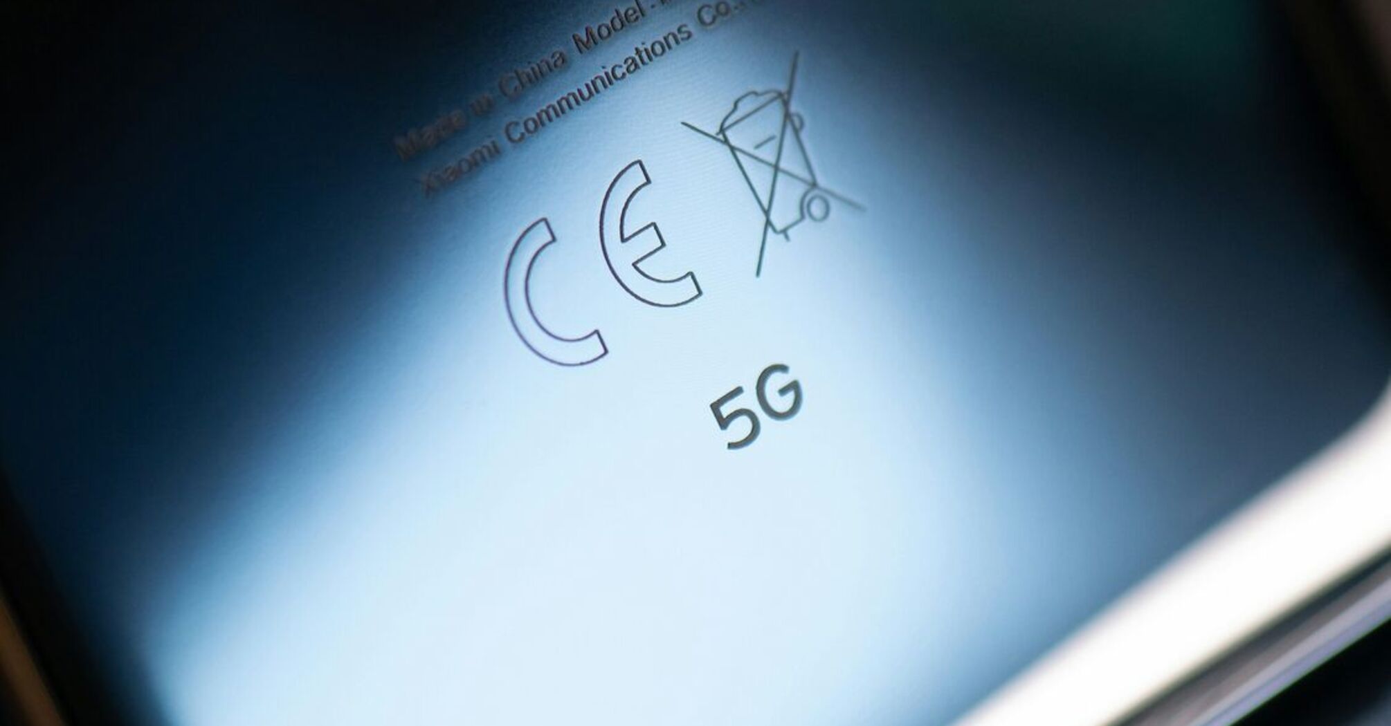 Close-up of a smartphone screen displaying the 5G network symbol
