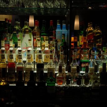 Dark night bar with a large selection of alcohol