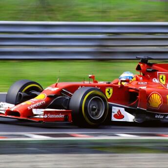 Red Ferrari at car racing