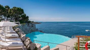 8 stunning hotel pools around the world, from a tropical oasis in the middle of a metropolis to endlessly landscaped jungle pools.