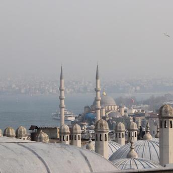 Mosque with minarets against the backdrop of a beautiful city