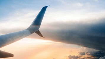 Airplane on sky during golden hour