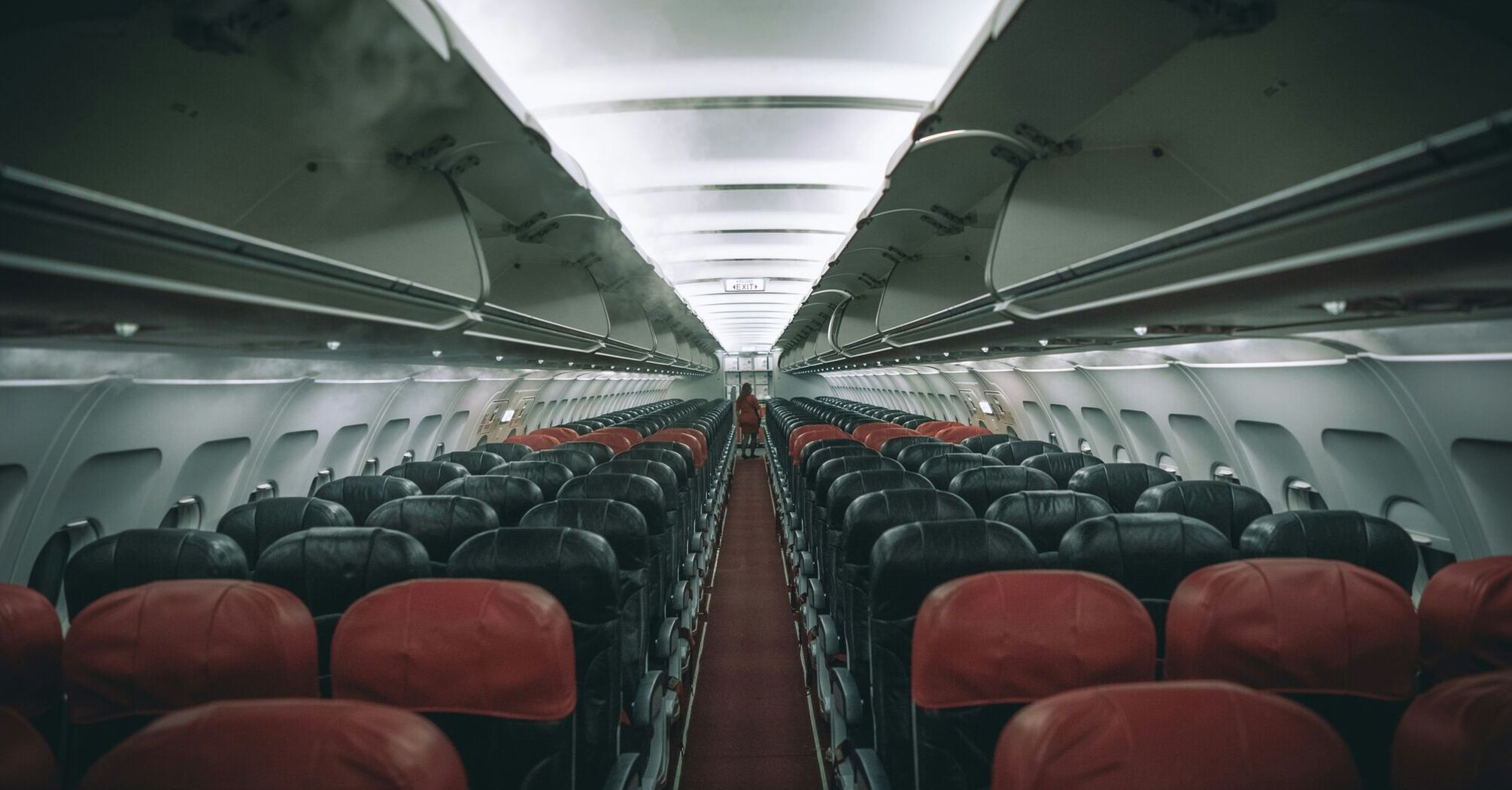 Rows of empty seats inside the airplane