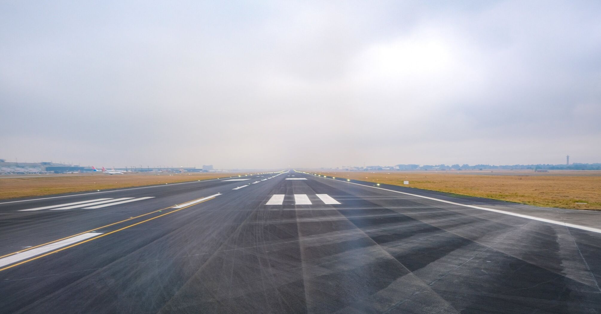 View of an empty runway at an airport 