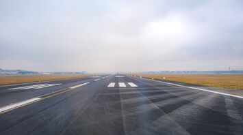 View of an empty runway at an airport