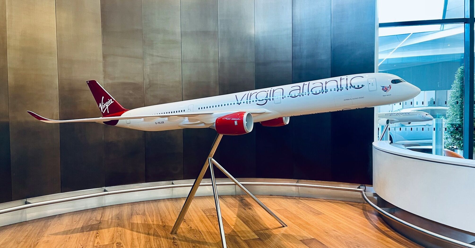 Virgin Atlantic Airbus airplane model on stand in airport lounge