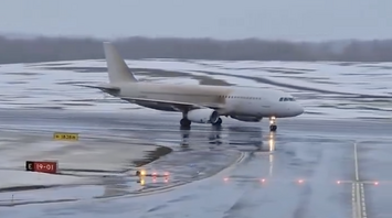 A passenger plane operated by Avion Express with 185 people on board skidded off the runway and rolled through a swamp