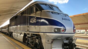 Amtrak train parked at a station platform