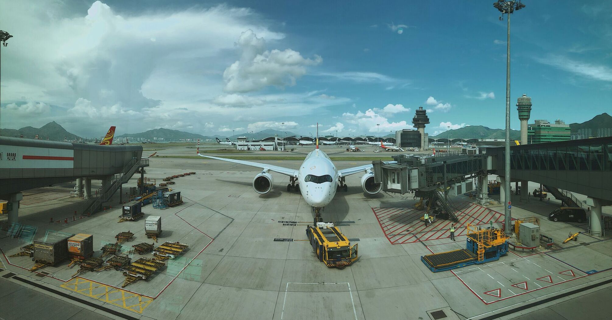 An airport worker in Hong Kong tragically died when he fell from a evacuator under the plane