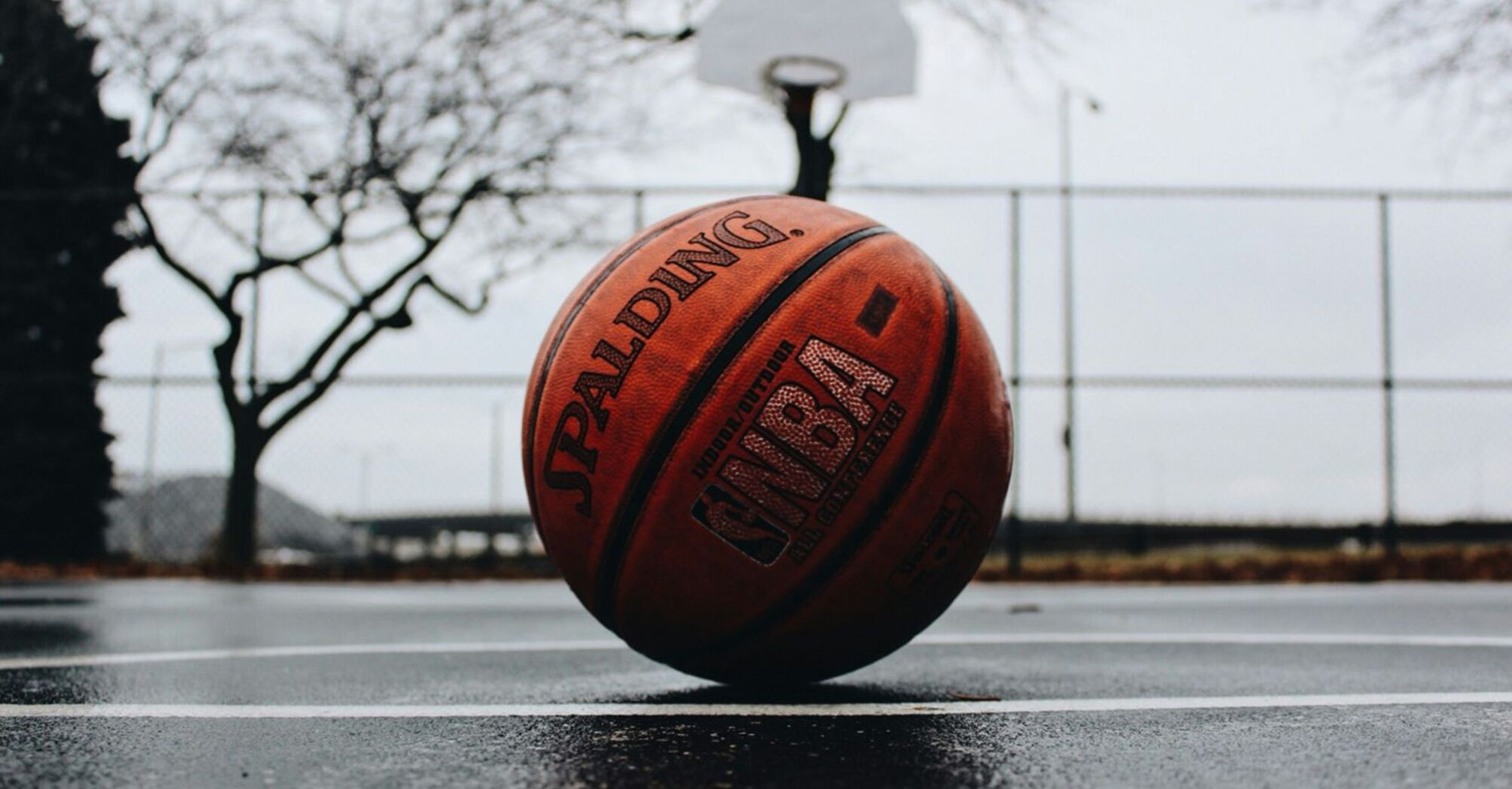NBA basketball lies on the playground