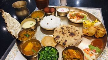 Why do people eat with their hands in India and such peculiar food traditions