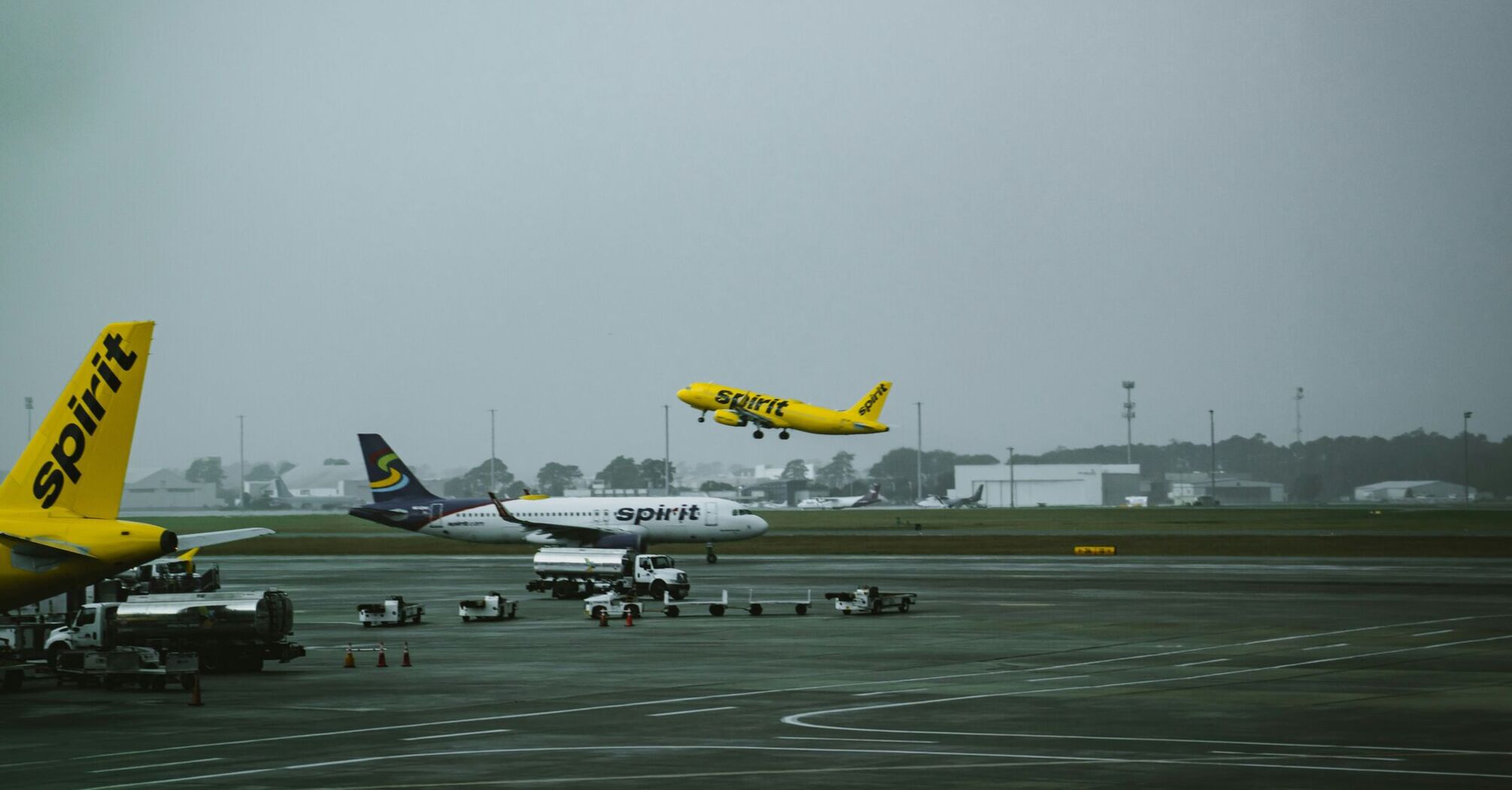 A group of airplanes at an airport