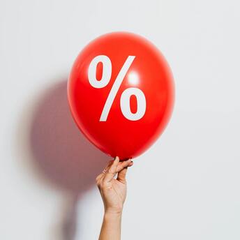 Red balloon with percentage symbol