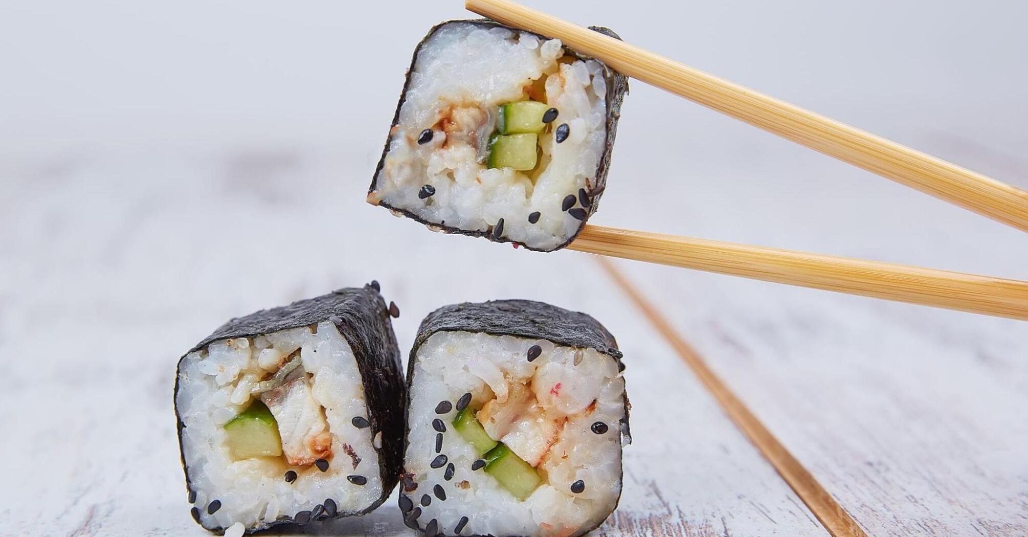 Three delicious sushi with shrimp and cucumber