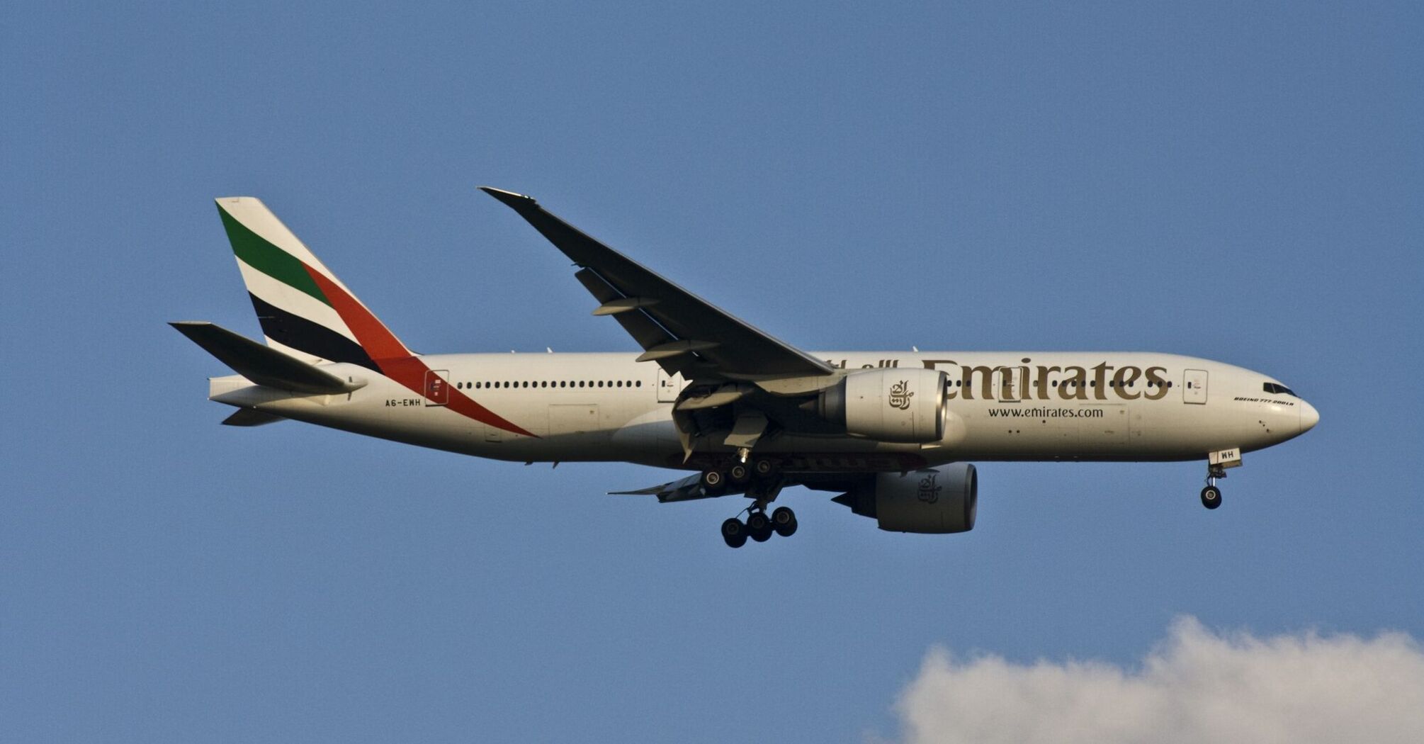 Emirates airline plane flying in the sky