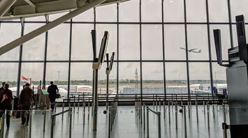 People walking on airport building