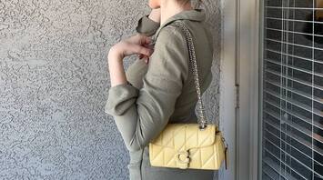This quilted travel bag is sure to brighten up your spring wardrobe