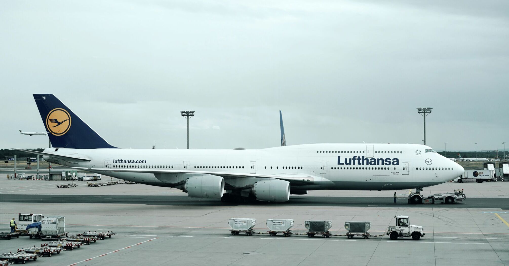 Lufthansa Boeing parked at an airport gate