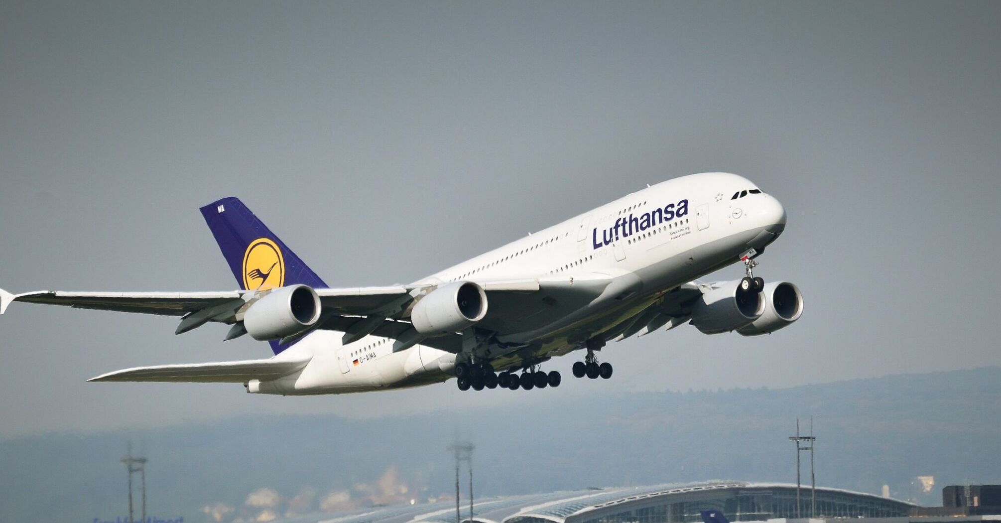 Lufthansa Airbus A380 aircraft in mid-flight approaching Frankfurt Airport